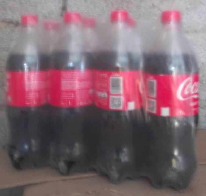 8 botellas de Coca Cola